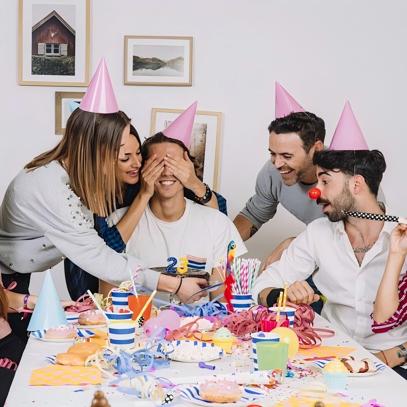 A group of adults are celebrating a birthday party.